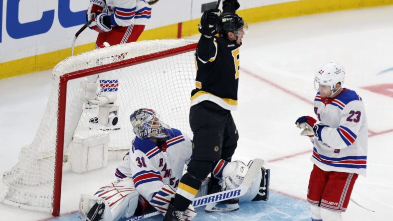 Shorthanded Rangers fall to Bruins despite strong effort.